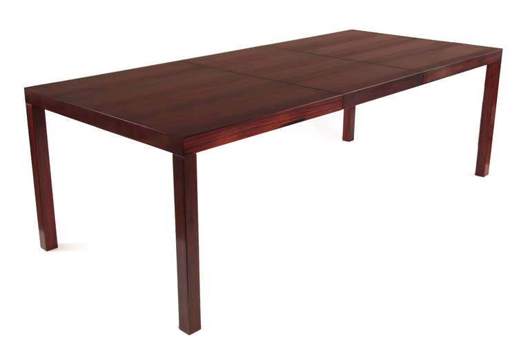 Milo Baughman for Thayer Coggin dining table circa mid 1960's. This example has a striped top consisting of strips of rosewood mahogany and oak. The legs are solid rosewood. It has recently been beautifully restored.