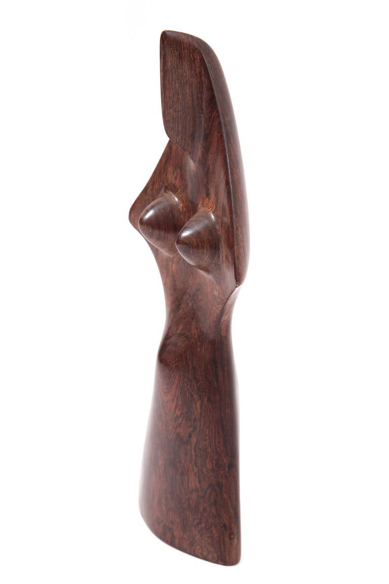 Fabulous solid rosewood figural sculpture, circa mid-1960s. This example executed in beautifully grained solid rosewood looks wonderful from every angle.