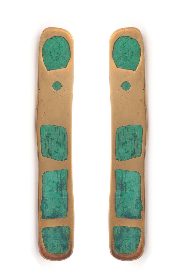 Pair of Pepe Mendoza brass and glazed ceramic door handles circa late 1950's. These fabulous examples have inset turquoise glazed ceramic forms in solid brass. Price listed is for the pair.
