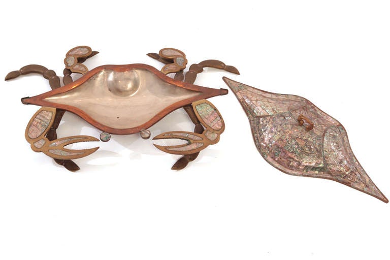 Stunning Los Castillo brass and abalone serving dish circa late 1950's. This example has inset abalone in the cover arms claws and eyes and interior and is constructed of solid patinated brass.
Perfect for serving, as an ashtray or simply as a