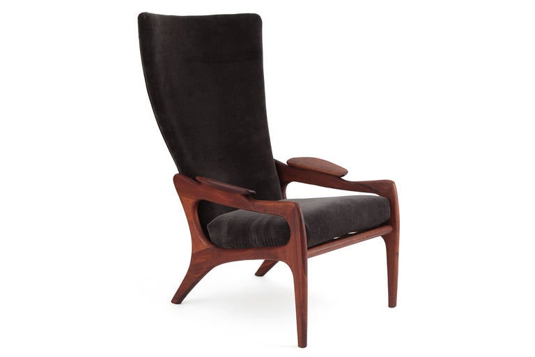 Adrian Pearsall sculpted walnut high back lounge chair circa early 1960's. this lovely example has been newly upholstered in a charcoal velvet mohair and the walnut frame newly oiled and waxed. Arm height is 20