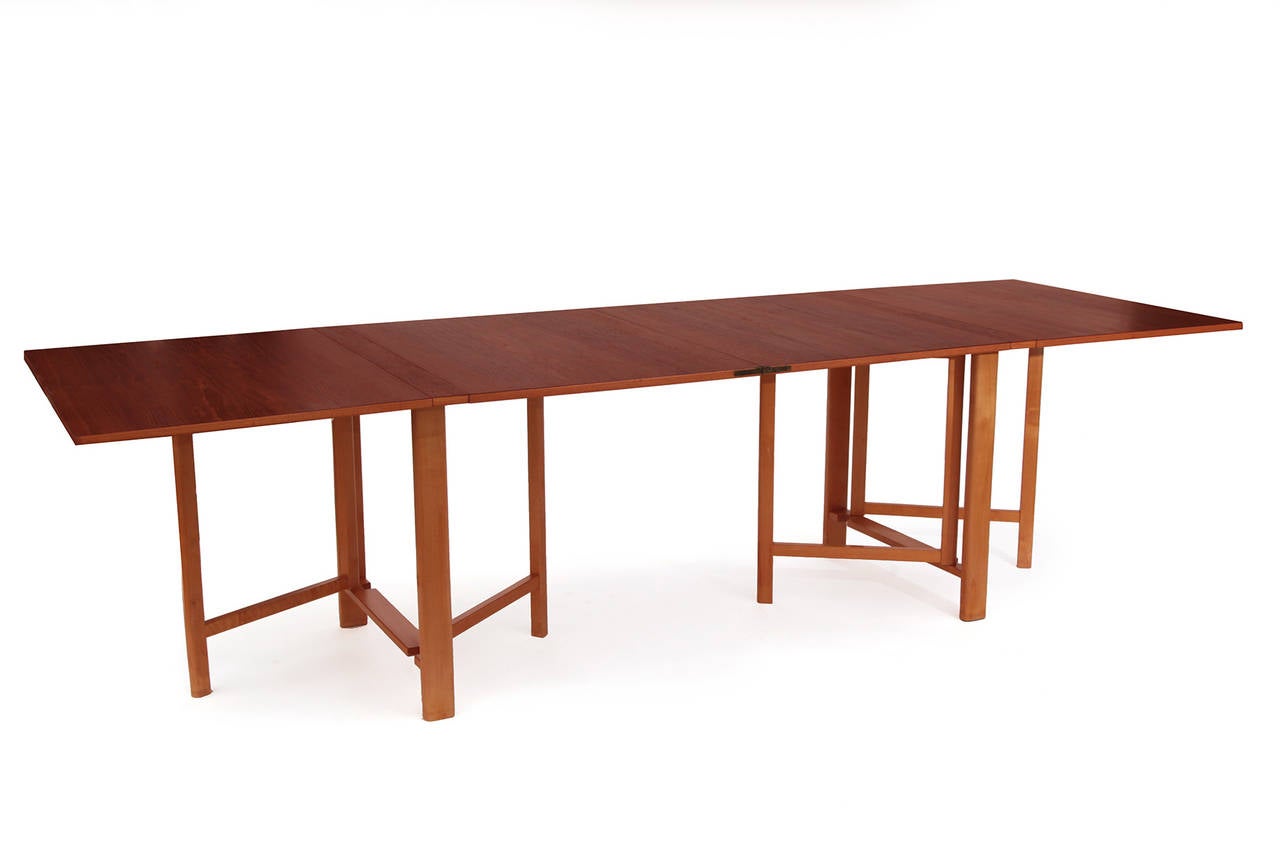 Bruno Mathsson for Karl Mathsson collapsible 'Maria' dining table from Denmark, circa late 1950s. This versatile example has a richly grained teak top with solid beech legs. Fabulous in that it can seat ten fully extended six when half extended and
