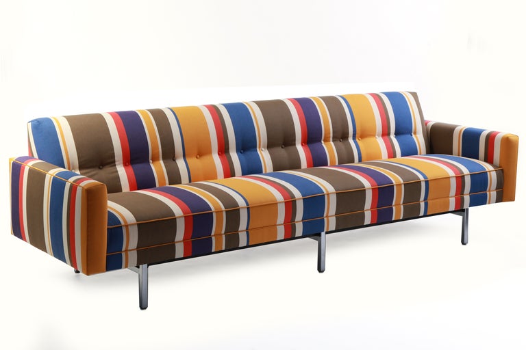 George Nelson for Herman Miller sofa circa mid 1960's. What makes this sofa extraordinary is the fabric. It has been upholstered in a dead stock original Alexander Girard striped textile and looks stunning juxtaposed with the satin finished steel