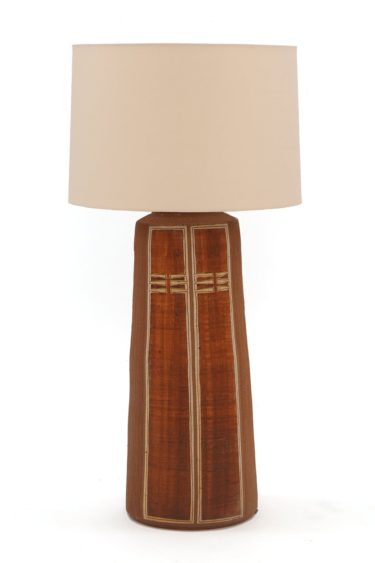 Monumental glazed earthenware lamp, circa early 1970s. This massive example nearly 30