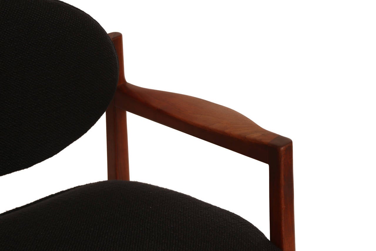 American Jens Risom Sculpted Walnut Armchairs with black upholstery, set of 8
