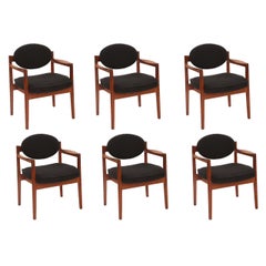 Jens Risom Sculpted Walnut Armchairs with black upholstery, set of 8