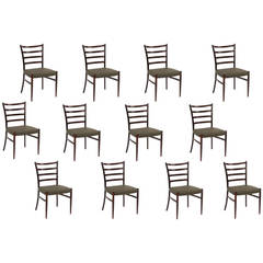 Twelve Solid Rosewood and Leather Danish Dining Chairs