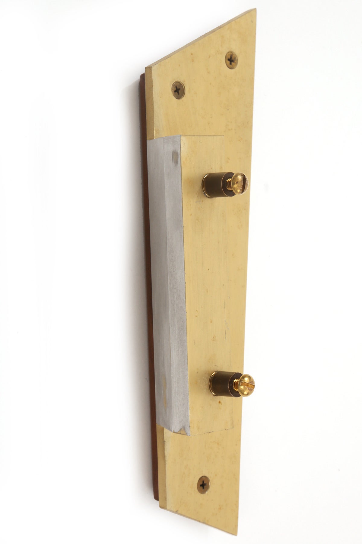 Anodized aluminum brass and walnut door handle, circa mid-1960s. This example has a beautifully grained solid walnut face on a brass face plate. 