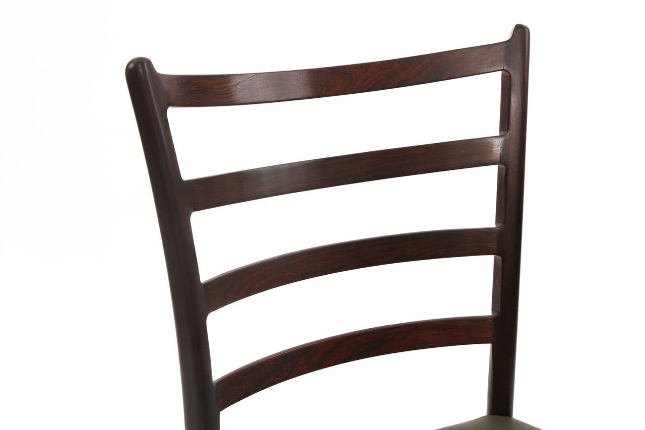 Twelve Solid Rosewood and Leather Danish Dining Chairs In Excellent Condition In Phoenix, AZ