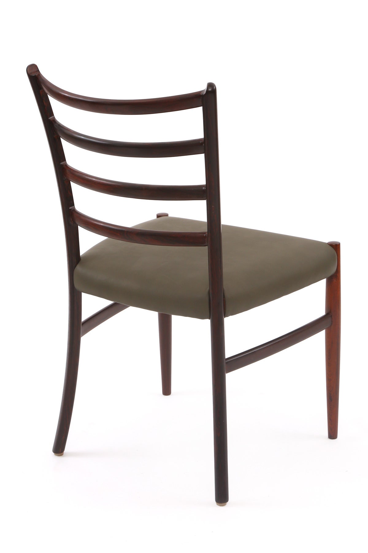 Mid-Century Modern Twelve Solid Rosewood and Leather Danish Dining Chairs