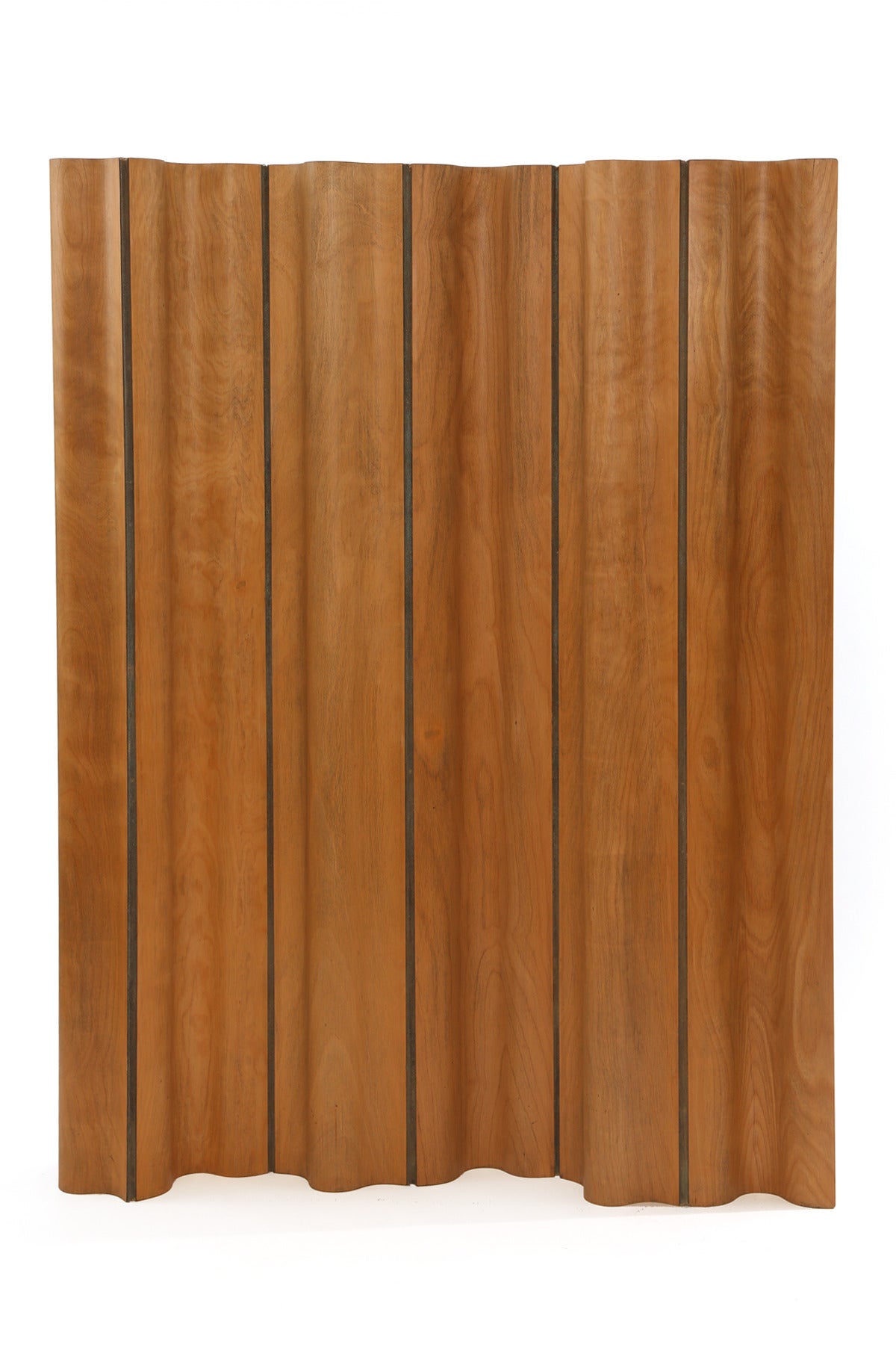 Early Charles and Ray Eames FSW folding screen, circa late 1940s. This six-panel example is hinged in canvas and executed in birch. Has a wonderful patina to the wood and canvas.

Each panel is 9.5