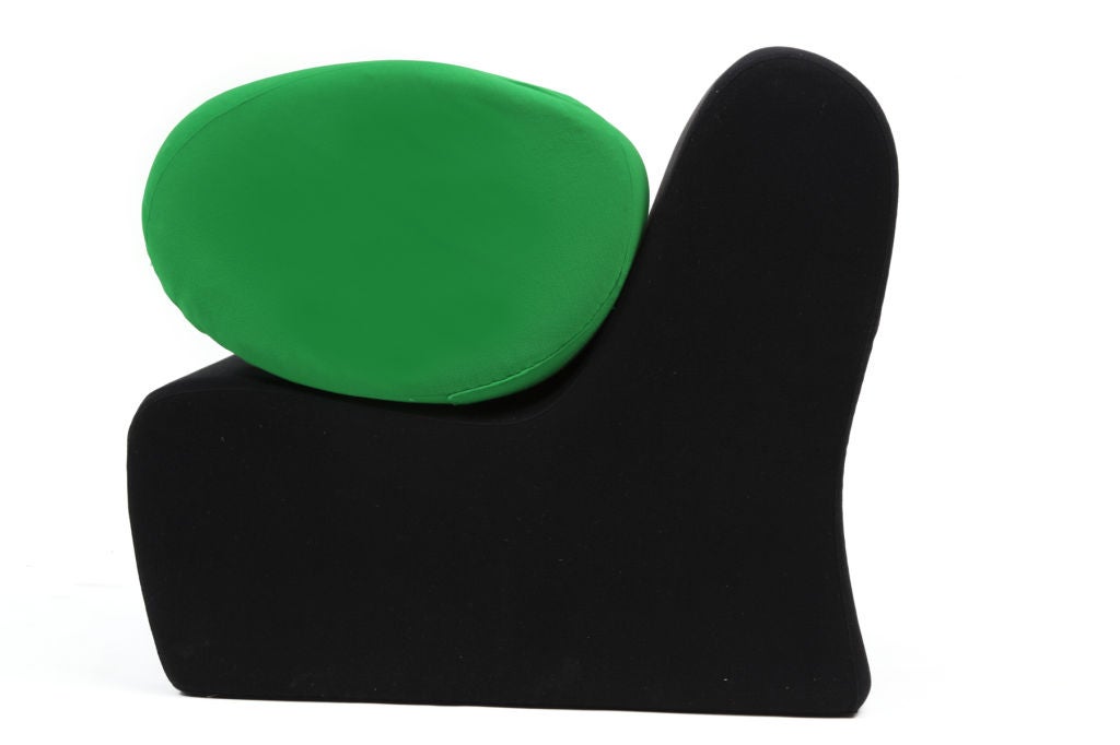 Rare Malitte sofa by Roberto Matta circa late 1960's. This late 1960's example is all original in its stunning black and vibrant green. This iconic seating arrangement has infinite possibilities and is composed of a two seater bench three chairs and