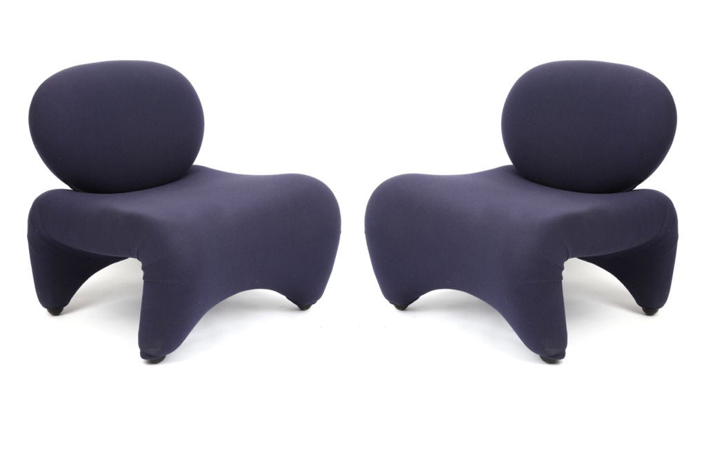 Pair of wonderfully formed lounge chairs by Carlo Bartoli. These examples are done in their original navy blue stretch fabric and feature free form contoured seats legs and backs. Price listed is for the pair.