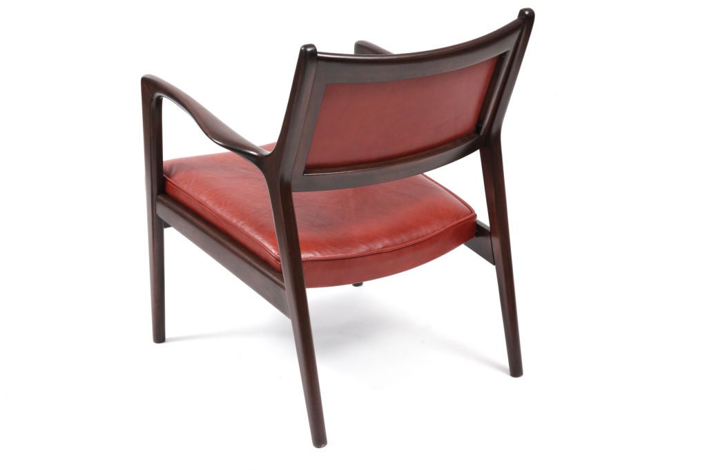 Mid-20th Century Pair of Teak and Leather Lounge Chairs
