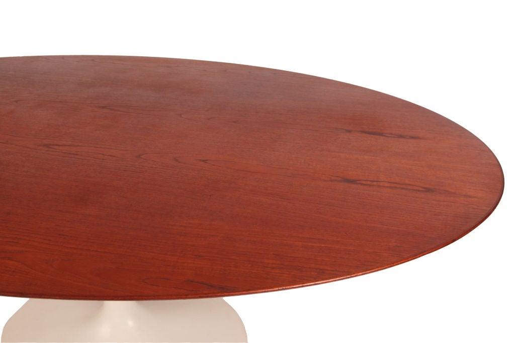 Early Eero Saarinen for Knoll oval dining table circa early 1950's. This all original example has a solid teak 78