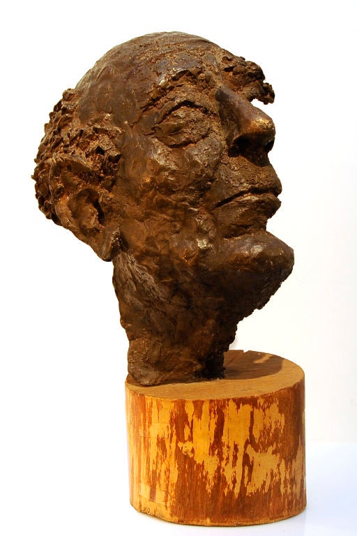 Wonderful bronze bust in the manner of Sir Jacob Epstein, circa late 1950s. This unusual example is a half highly detailed head with the interior structure exposed. The texture color variation and technical prowess used in this sculpture are