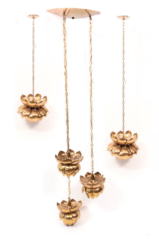3 brass lotus lamp chandelier by the Feldman company circa early 1970's. This can be seperated and lights can be sold as individual pendants. Please contact us for individual pricing. 