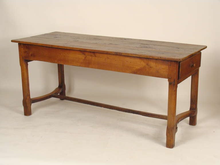Country French fruit wood farm table, 19th century.