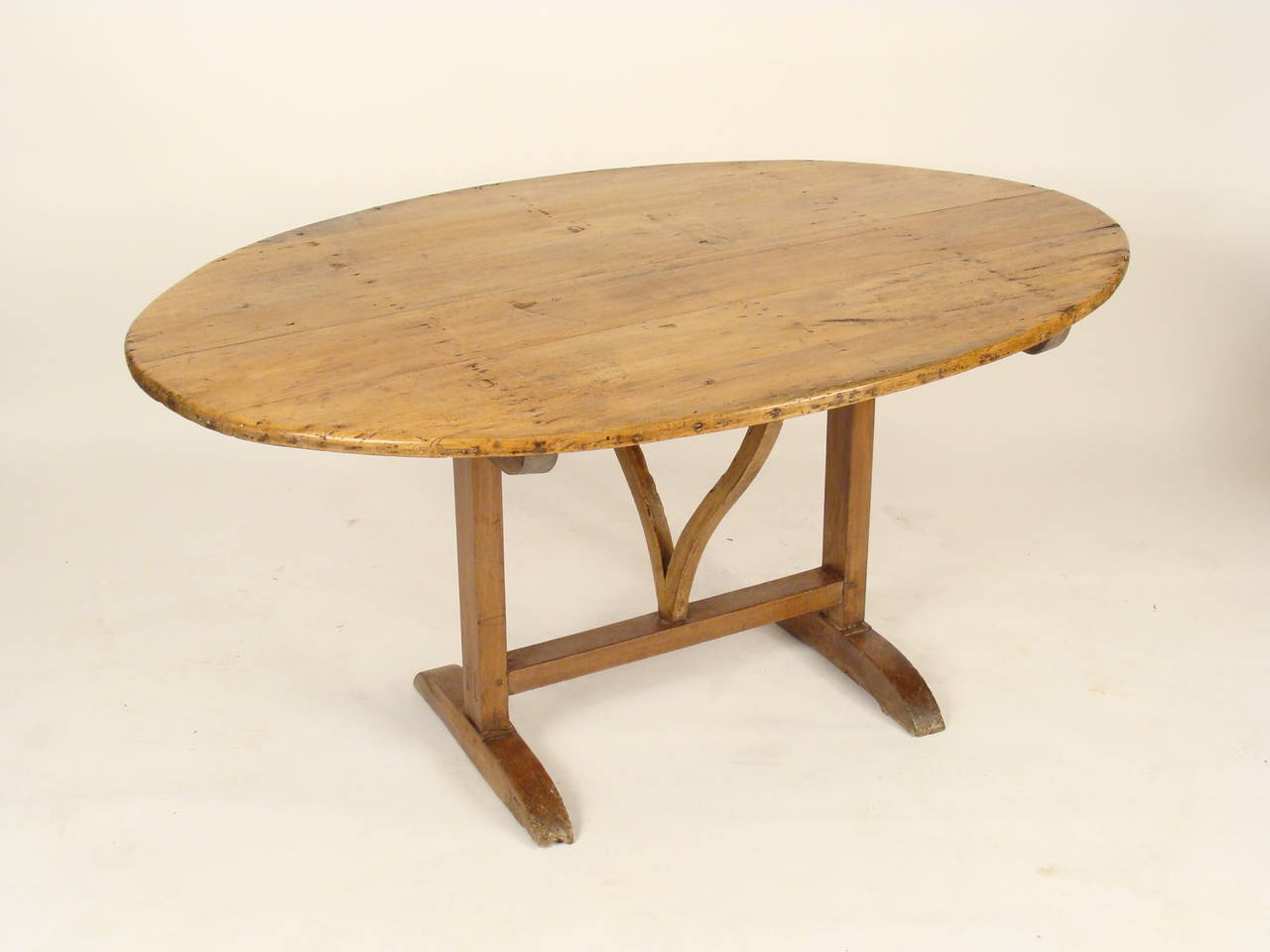 Antique French beechwood wine table, 19th century.