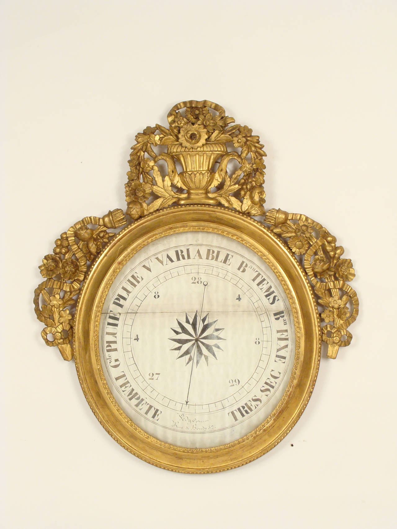 Louis XVI style giltwood barometer, 19th century. This is a nice large Louis XVI style barometer with old gold leaf.