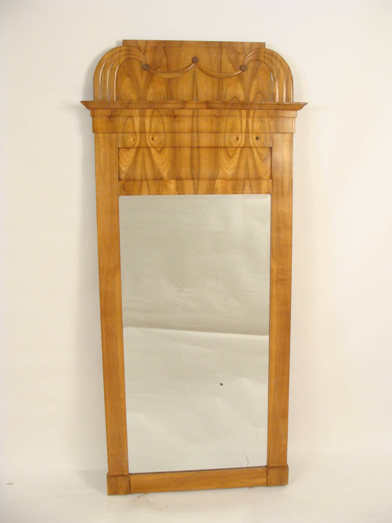 Biedermeier revival console and mirror, circa 1920. The wood is a nice burled wood, I am not 100% certain what the wood is, it looks like burled walnut.