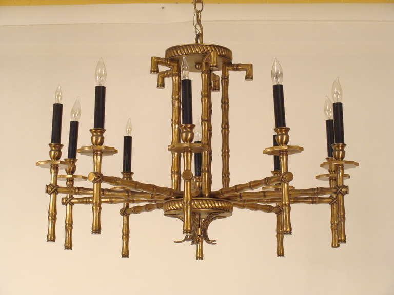 Faux bamboo style brass and metal 10 light chandelier, circa 1970. When inquiring about this chandelier please refer to store inventory number 13843.