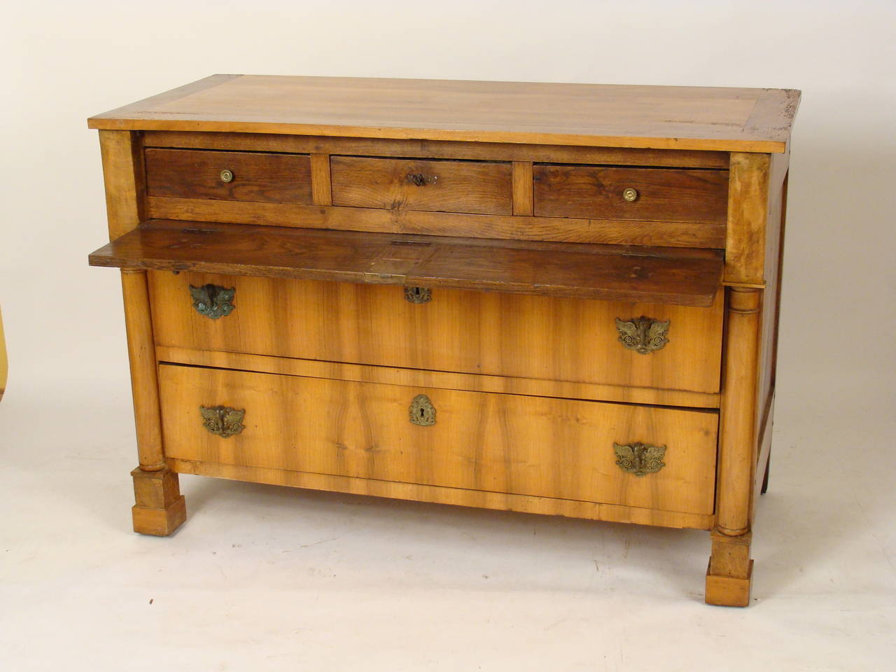 Continental Empire walnut and burl walnut chest of drawers or desk, circa 1825.