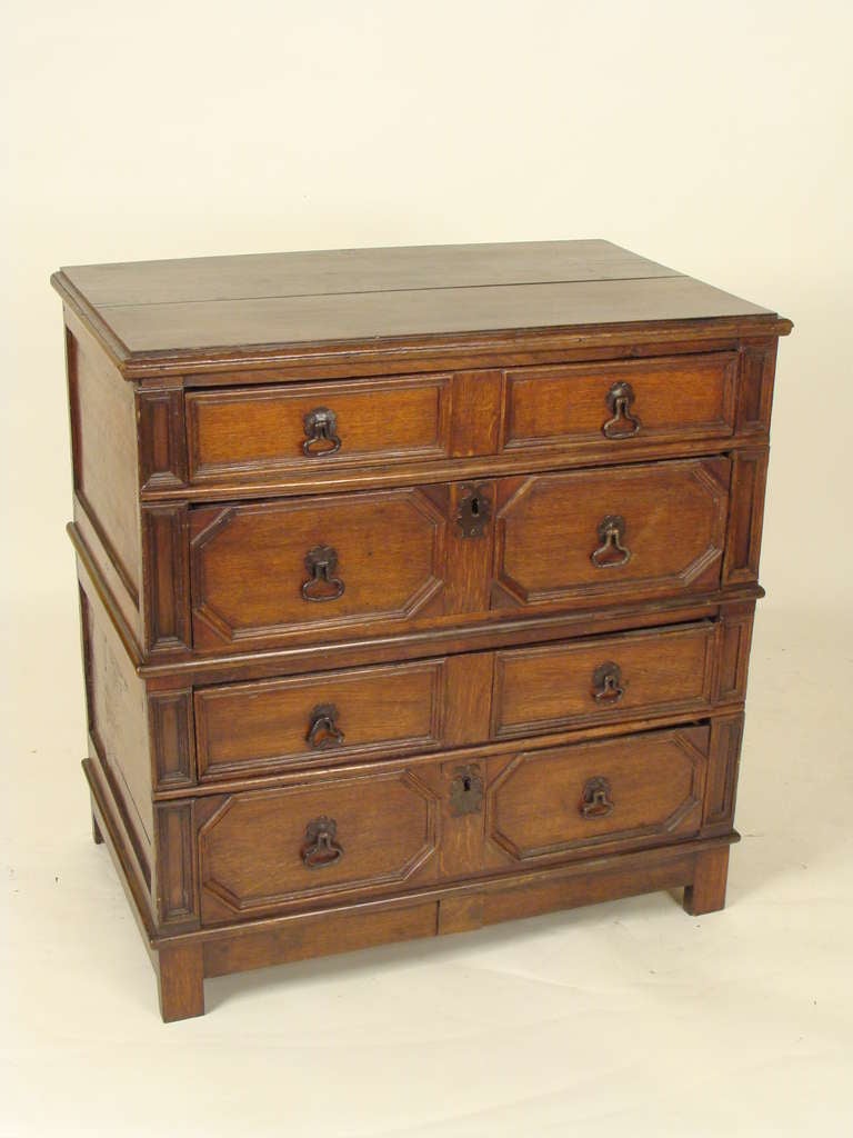 Antique Jacobean style oak chest of drawers, 19th century. This chest of drawers has nice old color. This is a nice old chest of drawers, it looks period, it has some replaced parts (drawers reconstructed), I feel more comfortable dating it as 19th