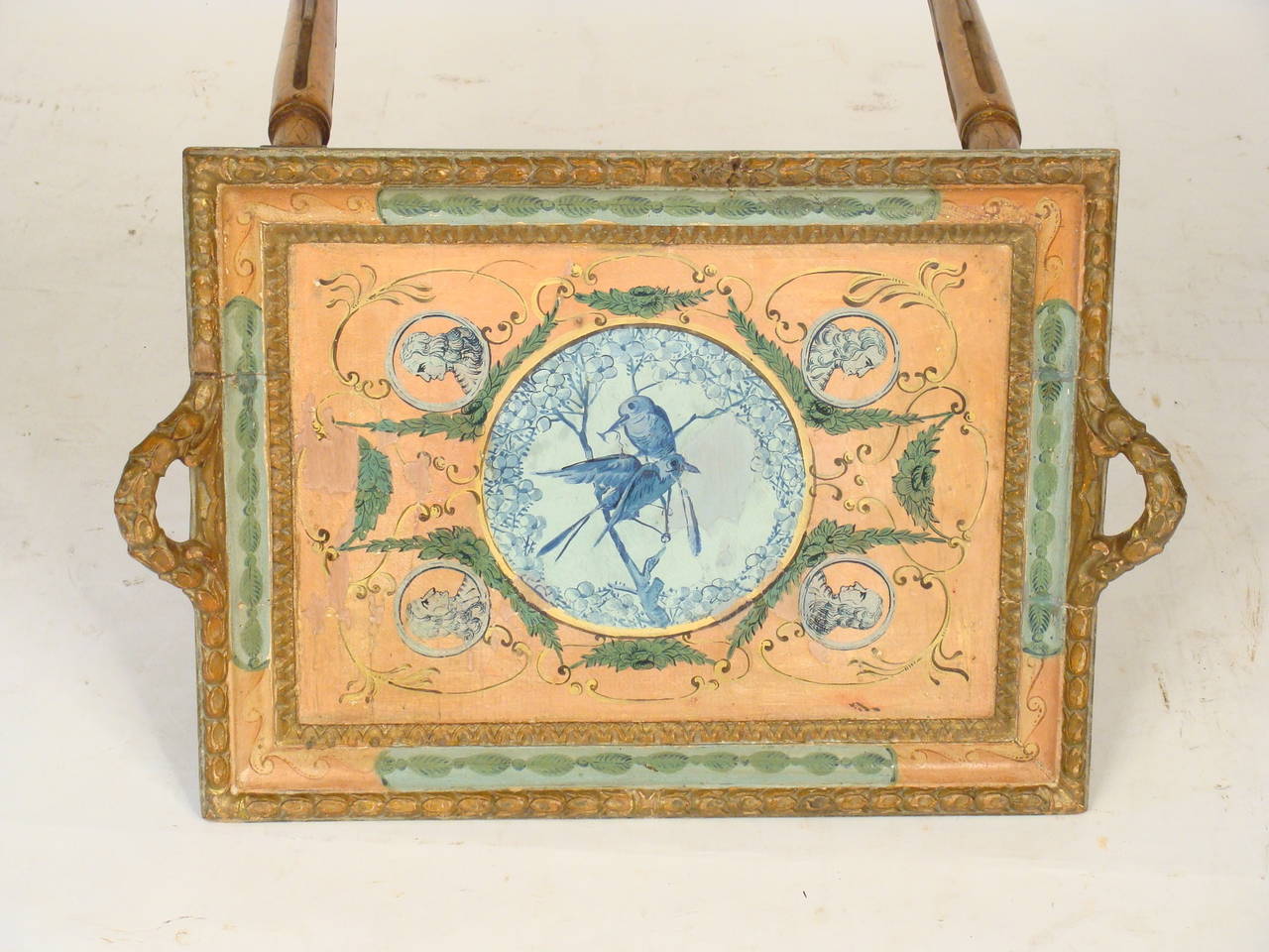 Louis XVI style painted Italian tray table, circa 1910. The tray top is removable, the surface beneath the tray is also painted, see image 5.
