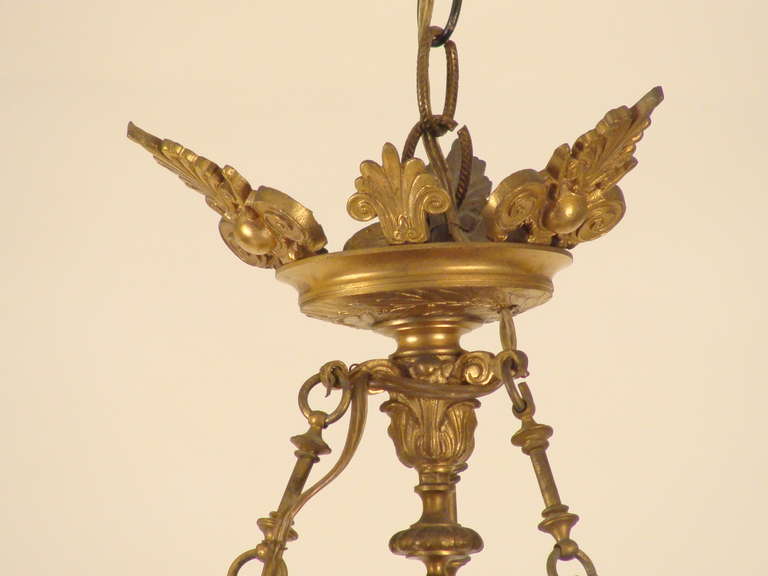 Ruby glass and gilt bronze six-light chandelier, circa late 19th century. When inquiring about this chandelier please use store inventory number 15231.