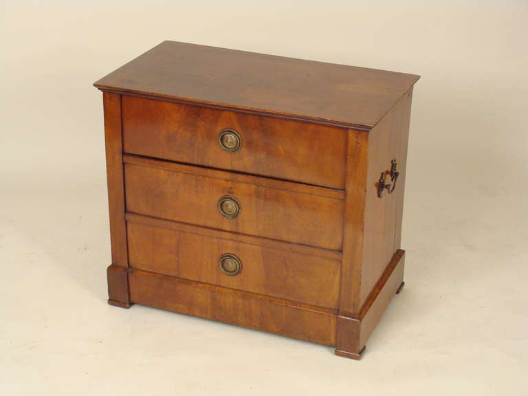 Empire occasional commode now converted with wine rack inside, first half of the 19th century. The alteration to accommodate the wine rack is mid to late 20th century.