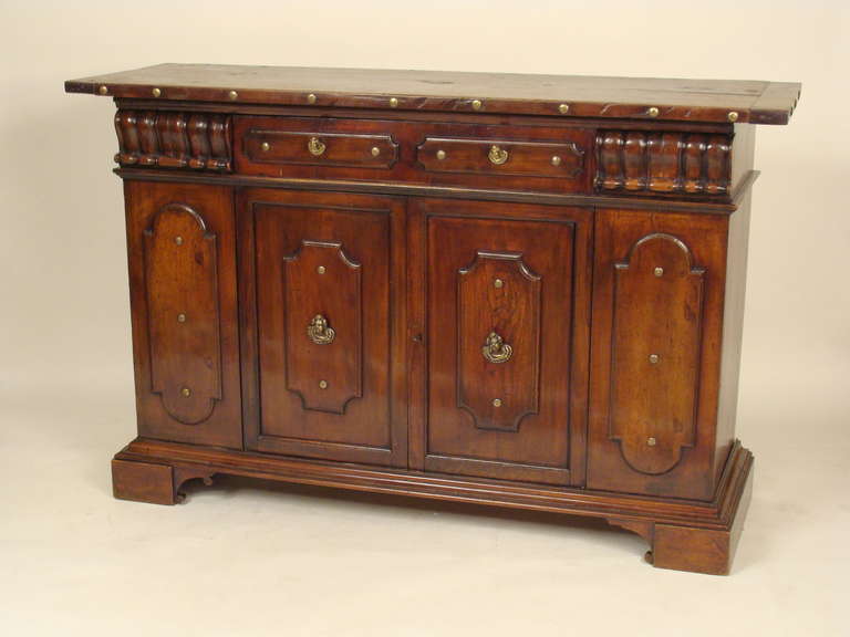 Continental Baroque style walnut credenza with bronze hardware, made from antique and later elements, circa 1950. When inquiring about this credenza please refer to store inventory number 15226.
