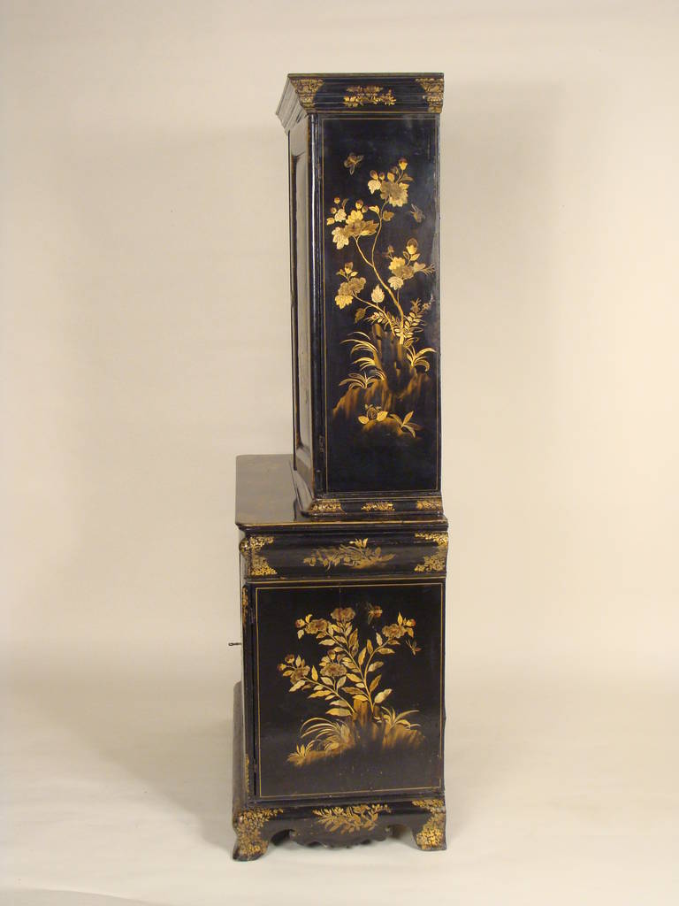 Continental Napoleon III style chinoiserie decorated two part cabinet, with raised chinoiserie decoration, circa 1890.