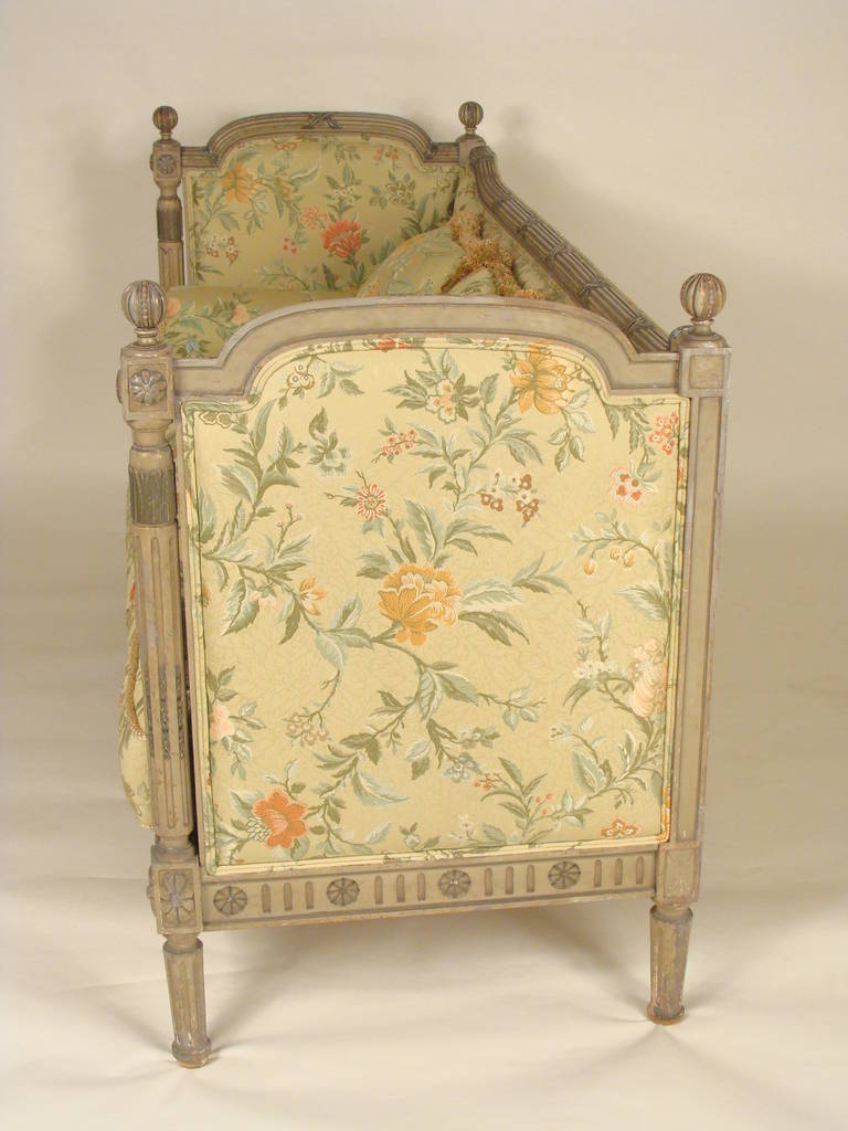 Louis XVI style painted sofa with floral upholstery, circa 1920.