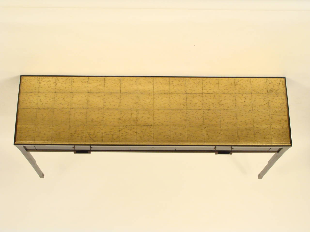 Bill Sofield for Baker black lacquer sofa table with a gilt decorated top, circa 2000.