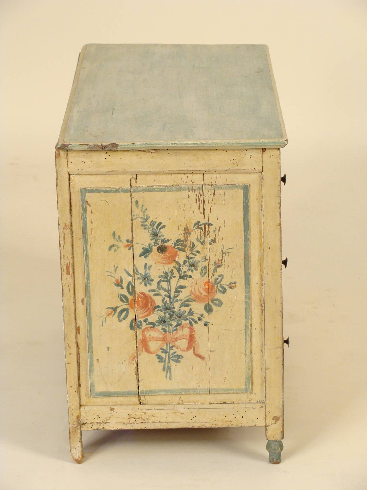 Louis XVI style painted child's chest of drawers, late 19th century. This chest has dovetailed construction on the drawers and mortise and tenon construction on the case. This chest could be used as an occasional table next to a chair.