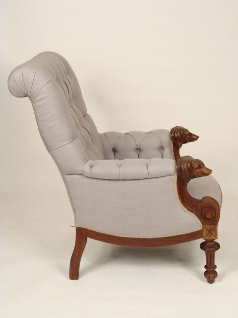 19th century occasional chair with arms ending in dog heads