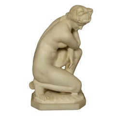 Marble statue of Venus kneeling