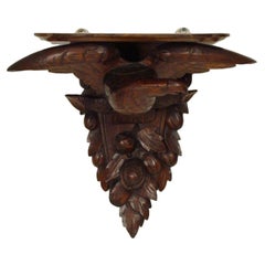 Carved eagle wall bracket