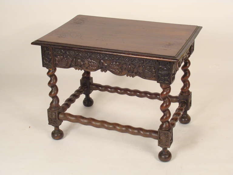 Louis XIV style occasional table with barley twist legs and a carved apron, 19th century.