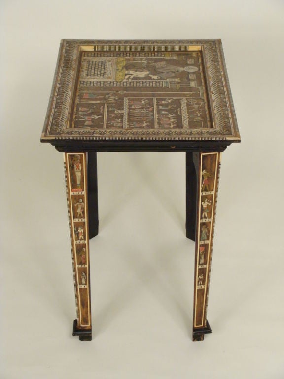 Egyptian revival inlaid occasional table, circa 1979.