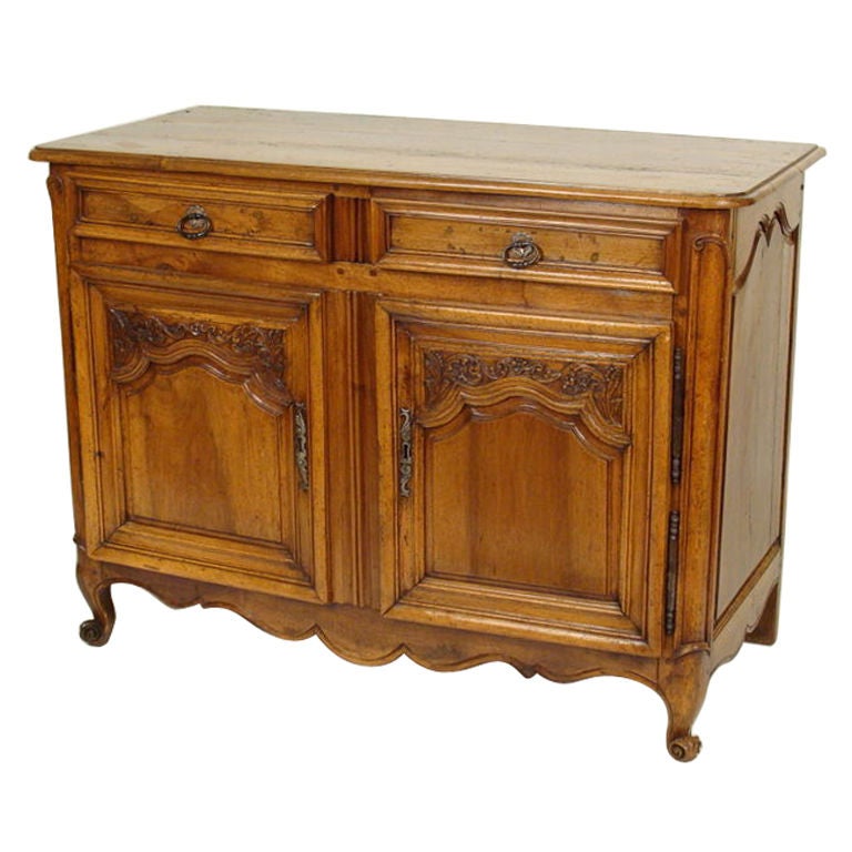 Louis XV provincial walnut buffet.