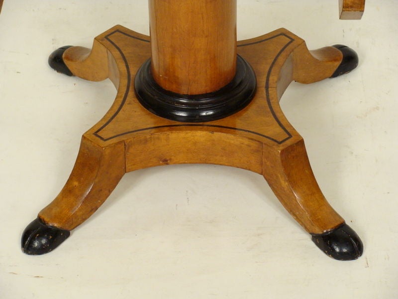 Wood Biedermeier drop leaf table.