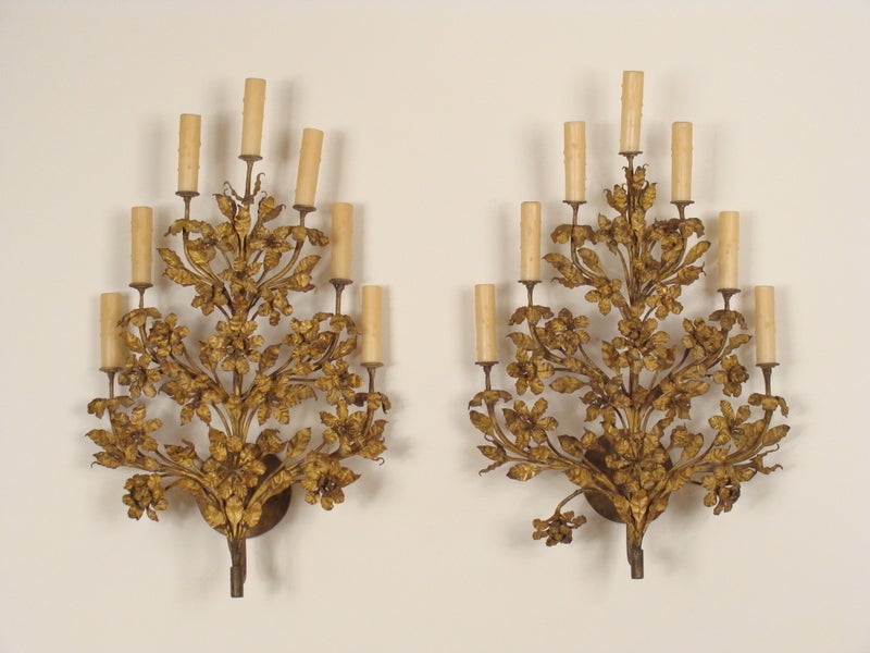 Pair of leaf form gilt metal decorated 7 light wall sconces, circa 1920-1940.