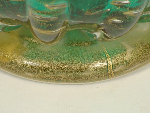 Green Murano glass bowl bearing a label that reads