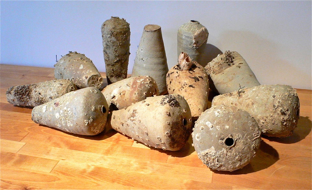 Stoneware with marine encrustation.<br />
Found in the south China sea off the Java coast.<br />
These were used for oils and medicinal purposes.<br />
Price is per bottle.