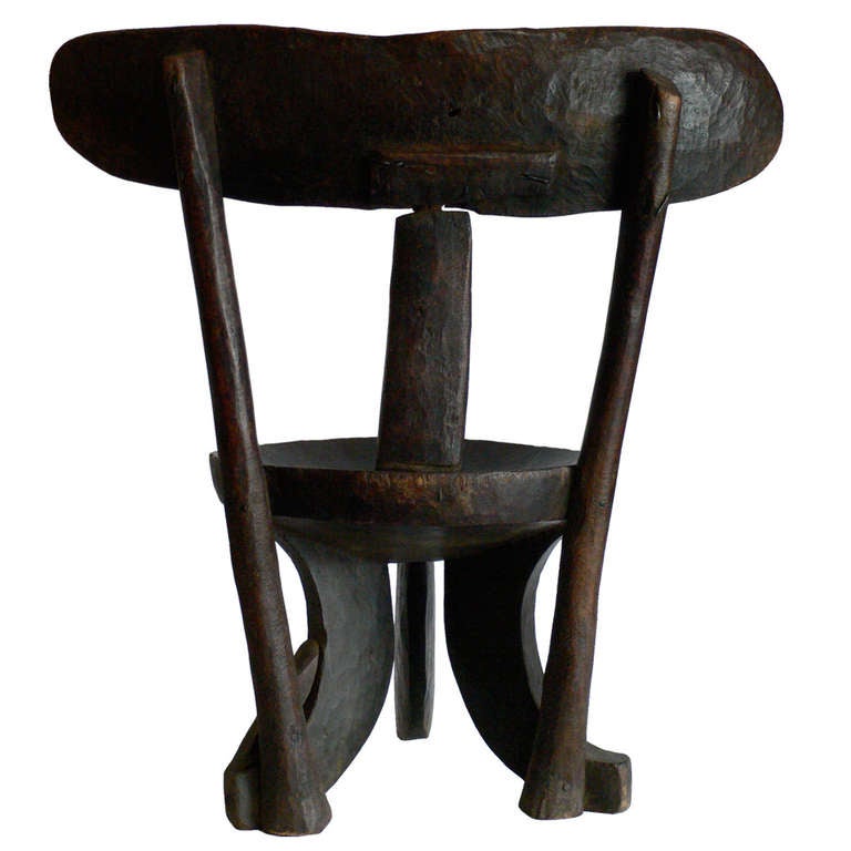 Unusual and rare Ethiopian high-back chair hand carved from hardwood.