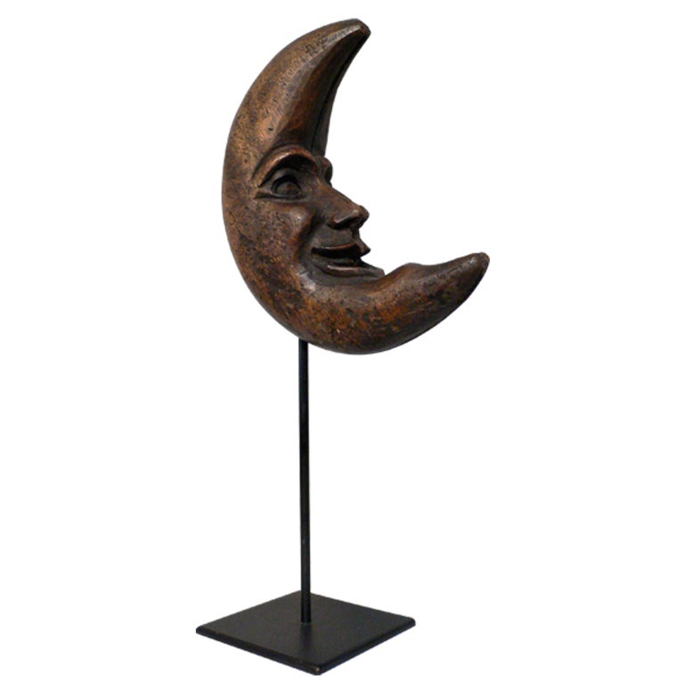 Early American hand-carved papier mache moon mold.
On later iron stand.
Wonderful, original patina.