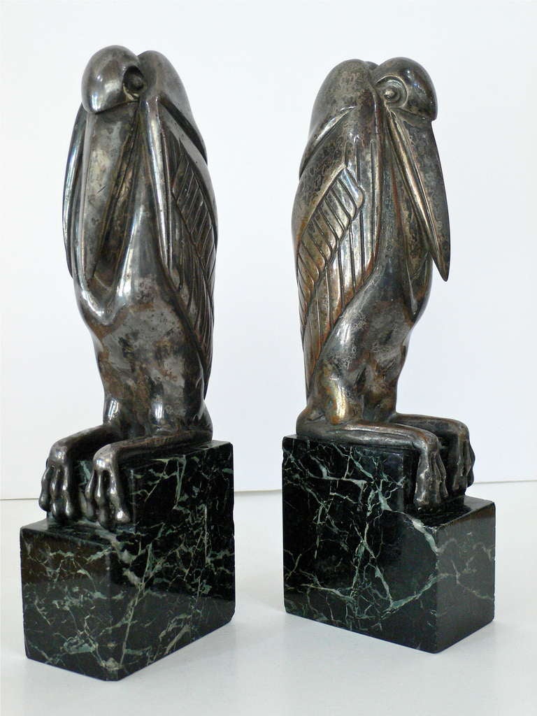 Silvered bronze marabout storks with green marble base.
Signed and numbered: Bouraine / Made in France