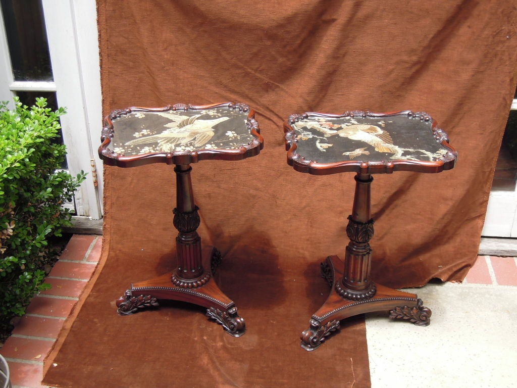 A pair of top quality rosewood small tables with tops of Japanese needlework under glass of birds on a black silk ground. These were converted from pole fireplace screens.  The wood frames undoubtedly by Gillows of Lancaster.